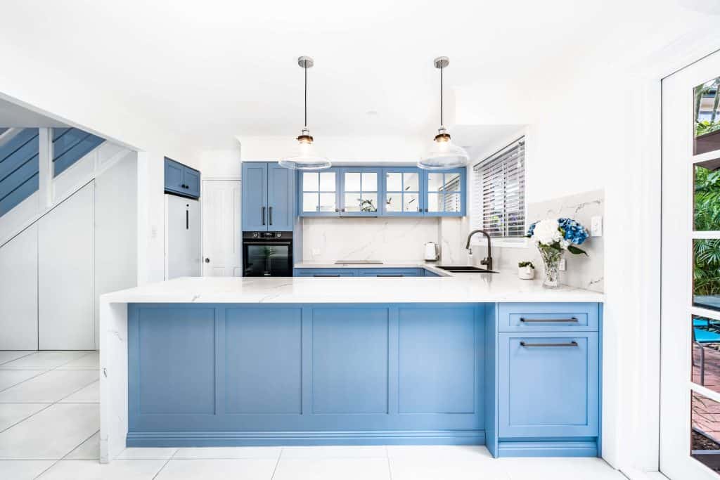 A wide front view of a luxurious modern kitchen remodel in Shailer Park.