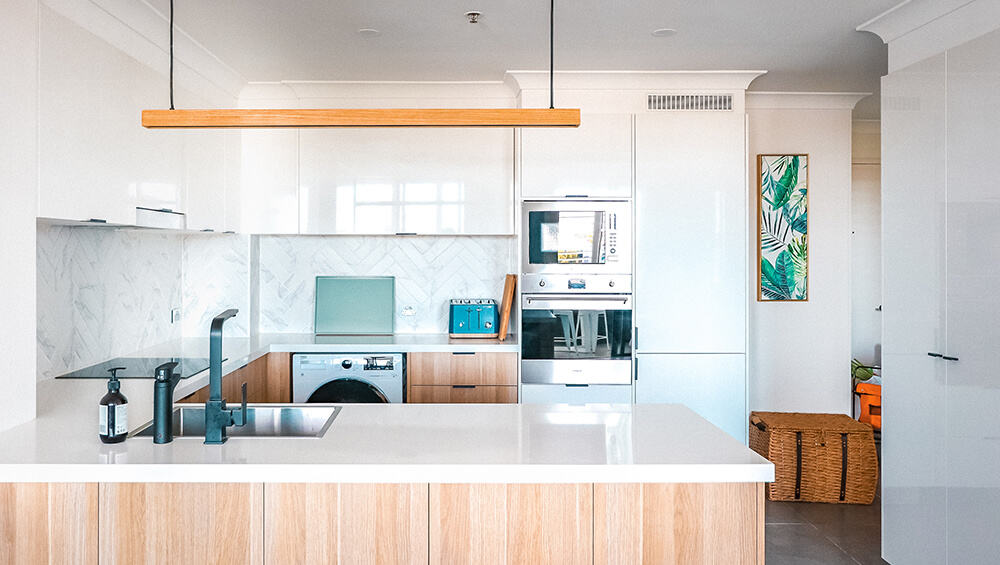 Wood and white modern peninsular kitchen